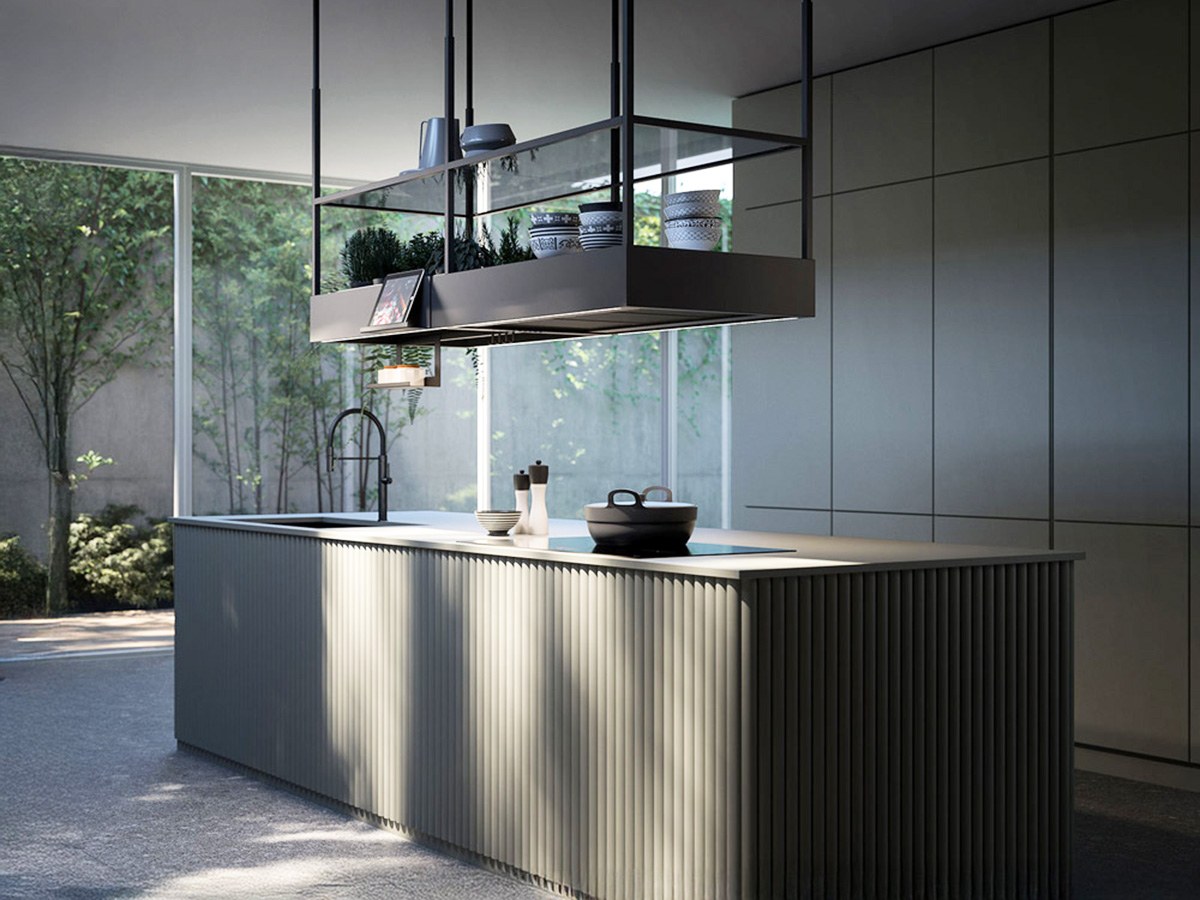 Cappa sospesa di design sopra un'isola cucina moderna